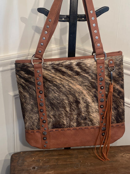 TRINITY RANCH HAIR ON COWHIDE CONCEALED CARRY TOTE